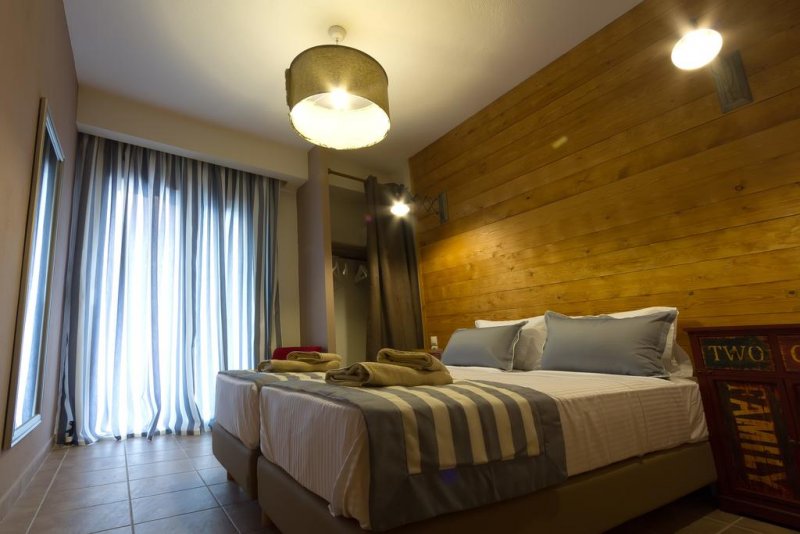 Ikies Luxury Apartments - Снимка 7