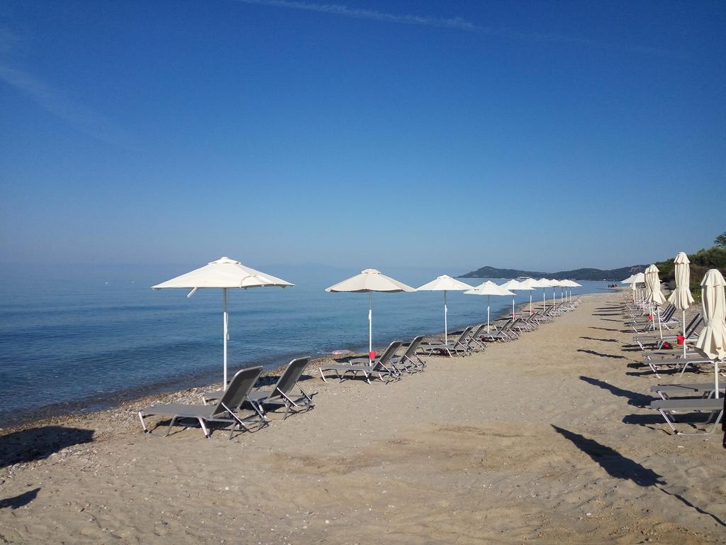 5 нощувки със закуски и вечери в Skion Palace Beach Hotel 4*, Халкидики, Гърция през Юли и Август! - Снимка 1