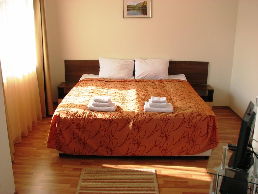 Нощувка на човек със закуска и вечеря + 2 топли минерални басейна и СПА зона от хотел Аквилон Резидънс & СПА, с. Баня - Снимка 20