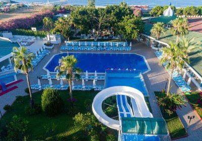 Почивка в The Garden Beach Hotel 4*, Алания, Анталия! Автобусен транспорт + 7 нощувки на база Аll Inclusive на човек + басейн и водни пързалки. Дете до 12.99г. безплатно